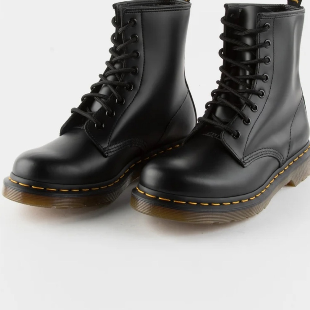 Dr. Martens Black Combat Boots with Smooth Leather and Durable Rubber Sole